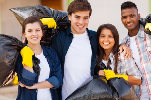 Customer and professional team during house clearance process